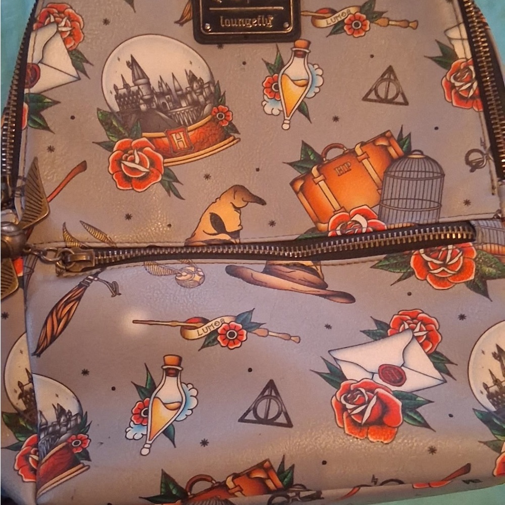 Loungefly Gray Backpack with Red and Orange Wizard Icons